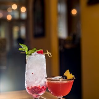 cocktail at bar near residences at midtown park apartments